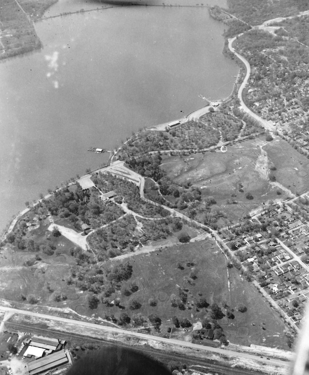 Aerial view of Nelson Park, Lake beach and boat dock